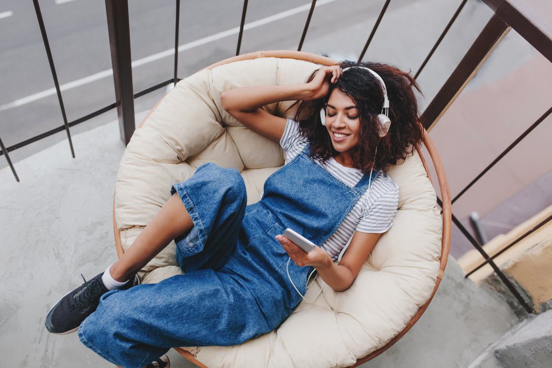 https://www.freepik.com/free-photo/pleased-black-girl-wearing-trendy-sport-shoes-chilling-chair-balcony-enjoying-morning-alone_10562569.htm#page=1&query=istening%20music&position=13Picture